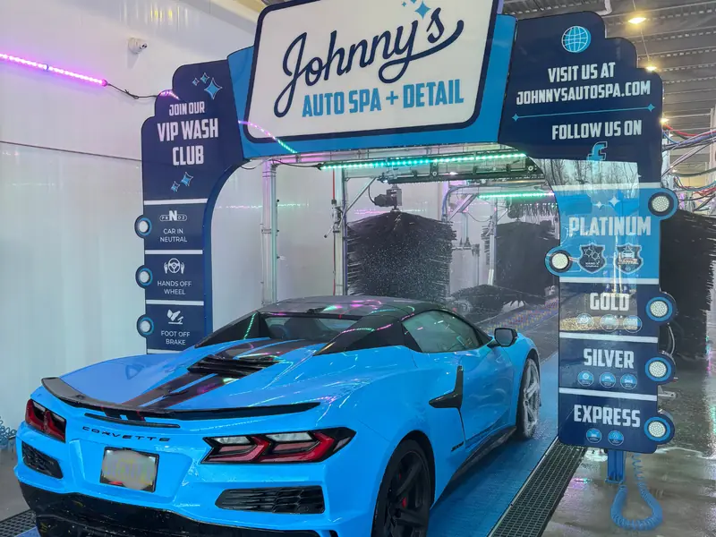Blue car in wash